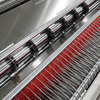 Fully Automatic Web-Guiding, Unwinding, and Longitudinal and Transverse Cutting Combination Machine